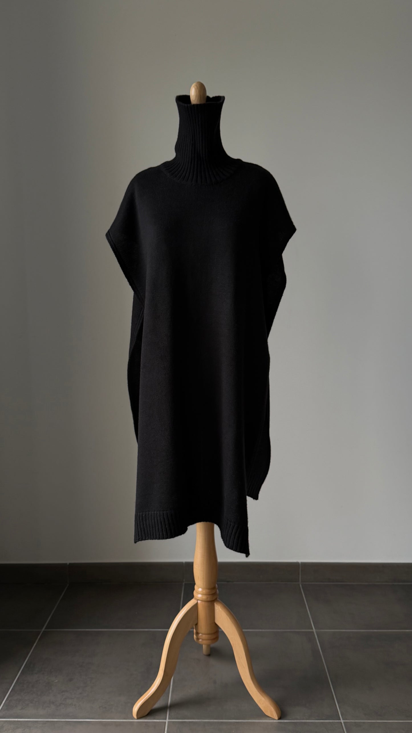 Knitted oversized turtleneck vest